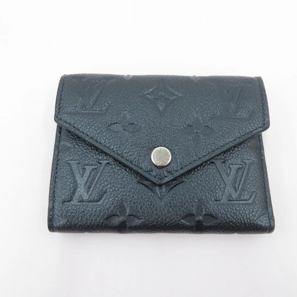 LOUIS VUITTON Monogram Empreinte Portefeuille Victorine Shimmery Ink Tri fold